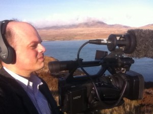 Filming for the BBC on the Isle of Islay looking across to the Isle of Jura (Inner Hebrides, Scotland)