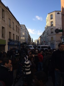 Close to the flat that was raided in Saint-Denis a crowd gathered